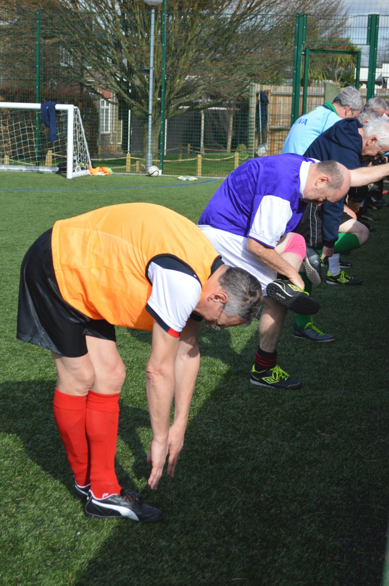 walking football holbrook stretching